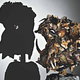 Illustration for article titled Gruesome shadow art transforms garbage and mummified rats into severed heads